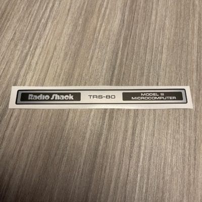 Radio Shack TRS-80 Model III silver sticker badge