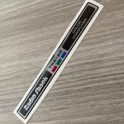 Radio Shack TRS-80 Color Computer silver sticker badge domed